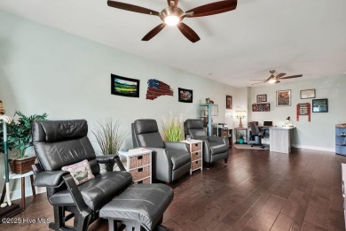 Welcome to this breathtaking 5-bedroom retreat, perfectly on Beau Rivage Golf and Resort in North Carolina - for sale on GolfHomes.com, golf home, golf lot