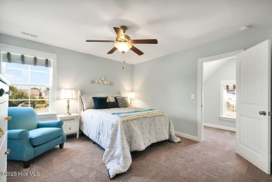 Welcome to this breathtaking 5-bedroom retreat, perfectly on Beau Rivage Golf and Resort in North Carolina - for sale on GolfHomes.com, golf home, golf lot