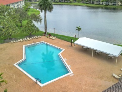 Bright & Clean first-floor 1-bedroom, 1-bathroom Century Village on Flamingo Lakes Country Club in Florida - for sale on GolfHomes.com, golf home, golf lot