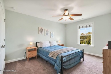 Welcome to this breathtaking 5-bedroom retreat, perfectly on Beau Rivage Golf and Resort in North Carolina - for sale on GolfHomes.com, golf home, golf lot