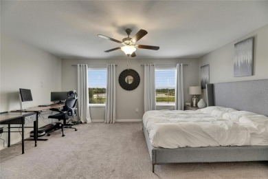 Welcome to 12952 Utopia Gardens Way - Tranquil Living with Water on Summerfield Crossing Golf Club in Florida - for sale on GolfHomes.com, golf home, golf lot
