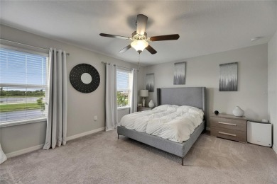 Welcome to 12952 Utopia Gardens Way - Tranquil Living with Water on Summerfield Crossing Golf Club in Florida - for sale on GolfHomes.com, golf home, golf lot