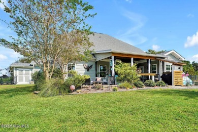 Welcome to this breathtaking 5-bedroom retreat, perfectly on Beau Rivage Golf and Resort in North Carolina - for sale on GolfHomes.com, golf home, golf lot