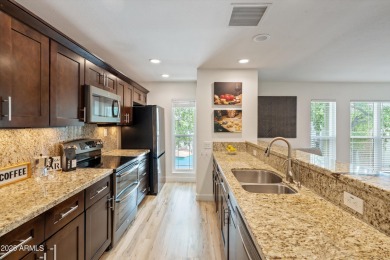 Wake up to sparkling pool views and enjoy resort-style living at on Arizona Biltmore Golf and Country Club in Arizona - for sale on GolfHomes.com, golf home, golf lot