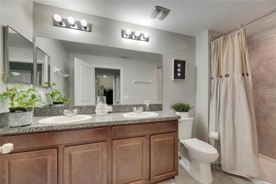 Welcome to 12952 Utopia Gardens Way - Tranquil Living with Water on Summerfield Crossing Golf Club in Florida - for sale on GolfHomes.com, golf home, golf lot