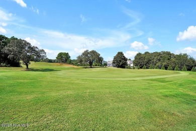 Welcome to this breathtaking 5-bedroom retreat, perfectly on Beau Rivage Golf and Resort in North Carolina - for sale on GolfHomes.com, golf home, golf lot