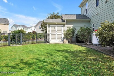 Welcome to this breathtaking 5-bedroom retreat, perfectly on Beau Rivage Golf and Resort in North Carolina - for sale on GolfHomes.com, golf home, golf lot