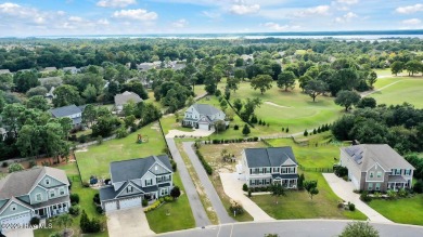 Welcome to this breathtaking 5-bedroom retreat, perfectly on Beau Rivage Golf and Resort in North Carolina - for sale on GolfHomes.com, golf home, golf lot