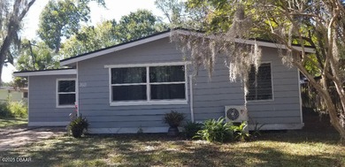 Welcome to your renovated, 3 bedroom, 1 bath house located on Riviera Country Club in Florida - for sale on GolfHomes.com, golf home, golf lot
