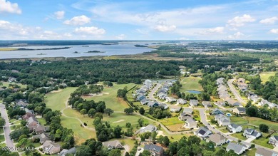Welcome to this breathtaking 5-bedroom retreat, perfectly on Beau Rivage Golf and Resort in North Carolina - for sale on GolfHomes.com, golf home, golf lot