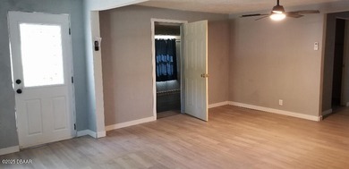 Welcome to your renovated, 3 bedroom, 1 bath house located on Riviera Country Club in Florida - for sale on GolfHomes.com, golf home, golf lot