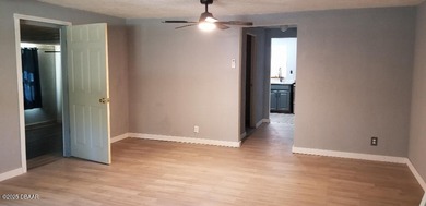 Welcome to your renovated, 3 bedroom, 1 bath house located on Riviera Country Club in Florida - for sale on GolfHomes.com, golf home, golf lot