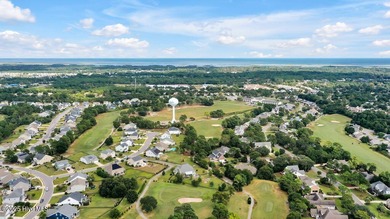 Welcome to this breathtaking 5-bedroom retreat, perfectly on Beau Rivage Golf and Resort in North Carolina - for sale on GolfHomes.com, golf home, golf lot