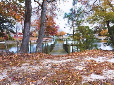 Welcome to Tee & Tide, a waterfront retreat where your days on Indian Creek Yacht and Country Club in Virginia - for sale on GolfHomes.com, golf home, golf lot