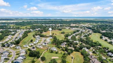 Welcome to this breathtaking 5-bedroom retreat, perfectly on Beau Rivage Golf and Resort in North Carolina - for sale on GolfHomes.com, golf home, golf lot