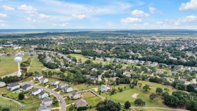 Welcome to this breathtaking 5-bedroom retreat, perfectly on Beau Rivage Golf and Resort in North Carolina - for sale on GolfHomes.com, golf home, golf lot