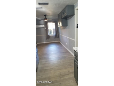 Welcome to your renovated, 3 bedroom, 1 bath house located on Riviera Country Club in Florida - for sale on GolfHomes.com, golf home, golf lot