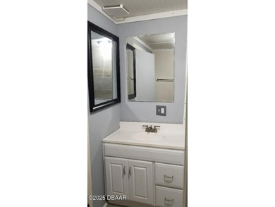 Welcome to your renovated, 3 bedroom, 1 bath house located on Riviera Country Club in Florida - for sale on GolfHomes.com, golf home, golf lot