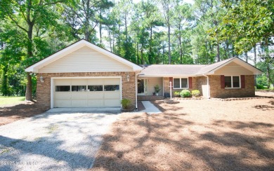 Charming single-level custom home located in the peaceful on Carolina Shores Golf Course in North Carolina - for sale on GolfHomes.com, golf home, golf lot