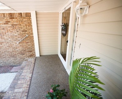 Charming single-level custom home located in the peaceful on Carolina Shores Golf Course in North Carolina - for sale on GolfHomes.com, golf home, golf lot