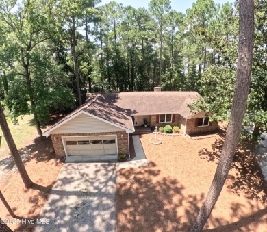 Charming single-level custom home located in the peaceful on Carolina Shores Golf Course in North Carolina - for sale on GolfHomes.com, golf home, golf lot