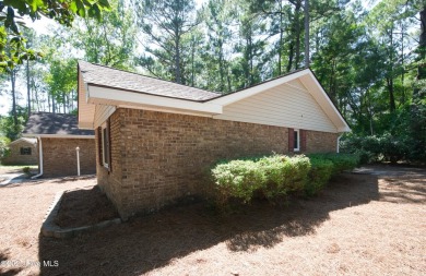 Charming single-level custom home located in the peaceful on Carolina Shores Golf Course in North Carolina - for sale on GolfHomes.com, golf home, golf lot