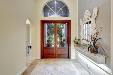 Nestled in the RARELY available Sand Cay community, this lovely on Ibis Golf and Country Club in Florida - for sale on GolfHomes.com, golf home, golf lot