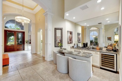 Nestled in the RARELY available Sand Cay community, this lovely on Ibis Golf and Country Club in Florida - for sale on GolfHomes.com, golf home, golf lot