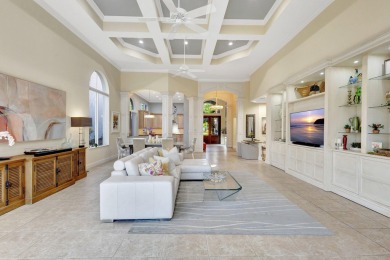 Nestled in the RARELY available Sand Cay community, this lovely on Ibis Golf and Country Club in Florida - for sale on GolfHomes.com, golf home, golf lot