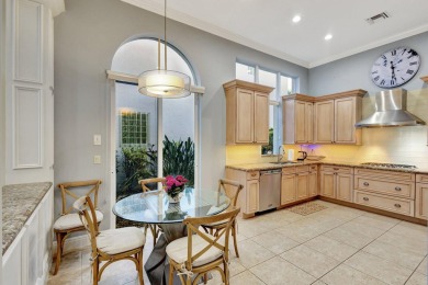 Nestled in the RARELY available Sand Cay community, this lovely on Ibis Golf and Country Club in Florida - for sale on GolfHomes.com, golf home, golf lot
