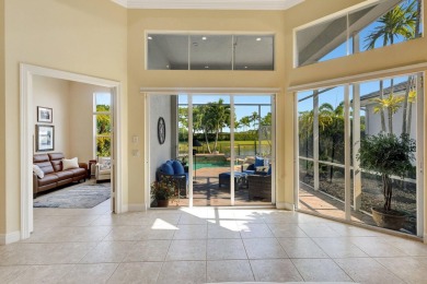 Nestled in the RARELY available Sand Cay community, this lovely on Ibis Golf and Country Club in Florida - for sale on GolfHomes.com, golf home, golf lot