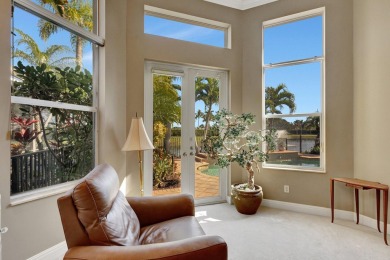 Nestled in the RARELY available Sand Cay community, this lovely on Ibis Golf and Country Club in Florida - for sale on GolfHomes.com, golf home, golf lot