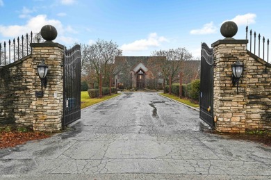 Behind the iron gates, against the leafy backdrop of Olympia on Olympia Fields Country Club in Illinois - for sale on GolfHomes.com, golf home, golf lot