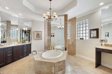 Nestled in the RARELY available Sand Cay community, this lovely on Ibis Golf and Country Club in Florida - for sale on GolfHomes.com, golf home, golf lot
