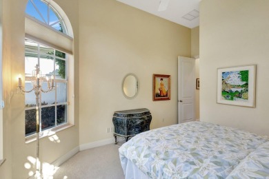 Nestled in the RARELY available Sand Cay community, this lovely on Ibis Golf and Country Club in Florida - for sale on GolfHomes.com, golf home, golf lot