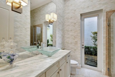 Nestled in the RARELY available Sand Cay community, this lovely on Ibis Golf and Country Club in Florida - for sale on GolfHomes.com, golf home, golf lot