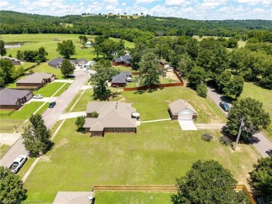 Move-in ready brick home on nearly an acre (two lots) just East on River Valley Golf Course in Arkansas - for sale on GolfHomes.com, golf home, golf lot