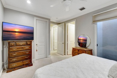 Nestled in the RARELY available Sand Cay community, this lovely on Ibis Golf and Country Club in Florida - for sale on GolfHomes.com, golf home, golf lot