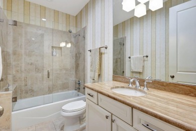 Nestled in the RARELY available Sand Cay community, this lovely on Ibis Golf and Country Club in Florida - for sale on GolfHomes.com, golf home, golf lot