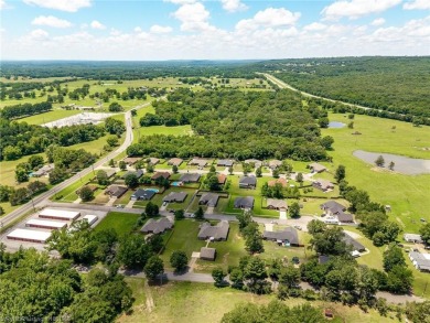 Move-in ready brick home on nearly an acre (two lots) just East on River Valley Golf Course in Arkansas - for sale on GolfHomes.com, golf home, golf lot