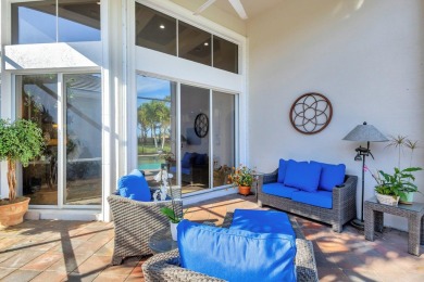 Nestled in the RARELY available Sand Cay community, this lovely on Ibis Golf and Country Club in Florida - for sale on GolfHomes.com, golf home, golf lot