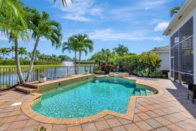 Nestled in the RARELY available Sand Cay community, this lovely on Ibis Golf and Country Club in Florida - for sale on GolfHomes.com, golf home, golf lot
