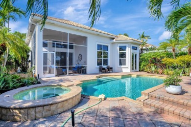 Nestled in the RARELY available Sand Cay community, this lovely on Ibis Golf and Country Club in Florida - for sale on GolfHomes.com, golf home, golf lot