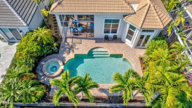 Nestled in the RARELY available Sand Cay community, this lovely on Ibis Golf and Country Club in Florida - for sale on GolfHomes.com, golf home, golf lot