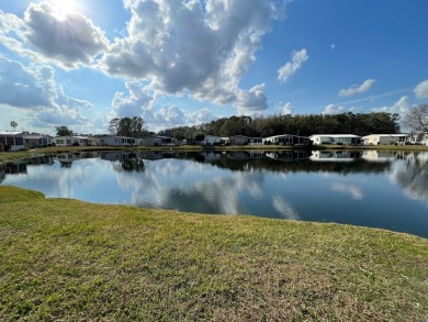 Listed by the Official Sales Team of Cypress Lakes Village on Big Cypress Golf and Country Club in Florida - for sale on GolfHomes.com, golf home, golf lot