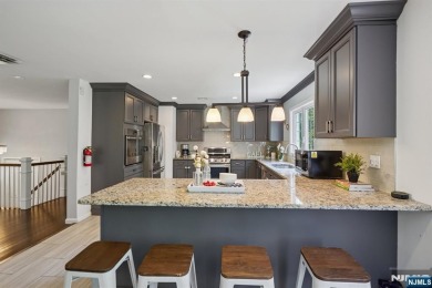 Enjoy this custom home nestled at the end of a quiet cul-de-sac on Crestmont Country Club in New Jersey - for sale on GolfHomes.com, golf home, golf lot