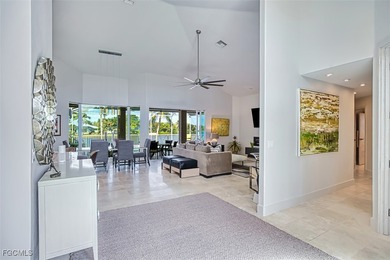 Sweeping water views will greet you when you walk into this on The Dunes Golf and Tennis Club in Florida - for sale on GolfHomes.com, golf home, golf lot
