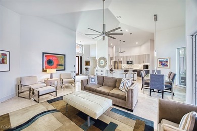 Sweeping water views will greet you when you walk into this on The Dunes Golf and Tennis Club in Florida - for sale on GolfHomes.com, golf home, golf lot