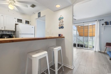 Discover this beautifully updated 2-bedroom, 1.5-bath townhome on Myrtlewood Golf Course and Club  in South Carolina - for sale on GolfHomes.com, golf home, golf lot