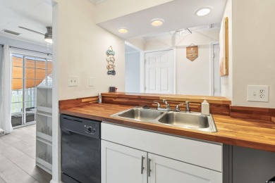 Discover this beautifully updated 2-bedroom, 1.5-bath townhome on Myrtlewood Golf Course and Club  in South Carolina - for sale on GolfHomes.com, golf home, golf lot